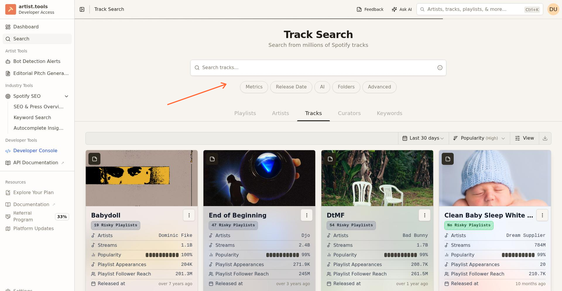 Track Search filter row showing Metrics, Release Date, AI, Folders, and Advanced