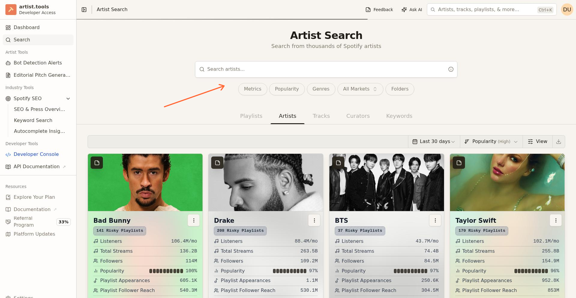 Artist Search filter row showing Metrics, Genres, Country, and Folders
